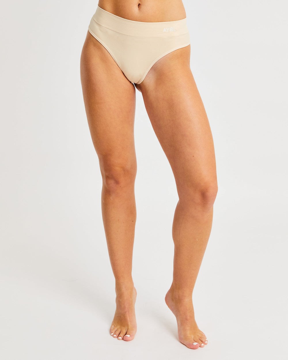 AYBL Seamless High Rise Tanga Nude | 41AYOSIZV