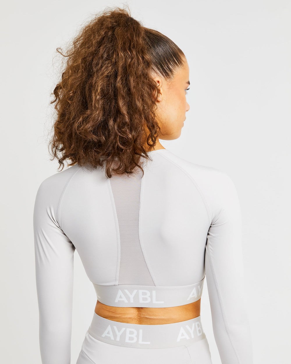 AYBL Pulse Seamless Long Sleeve Crop Top Větrovky Lacný - Tricko